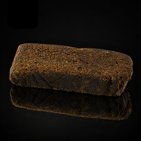 Résine CHARAS CBD 22–24 % – texture brun sombre légèrement grasse | SUPRHEMP