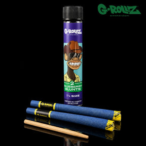 Tube G-ROLLZ Blue Ape Blueberry avec deux blunts bleus pré-roulés format 1¼ et stick de tassage